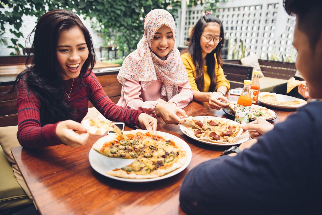 How to Plan a Half-Topping Pizza Delivery Order for Different Preferences