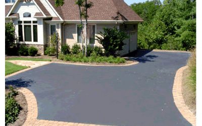 How Asphalt-to-Concrete Joints Are Sealed Around Curbs, Aprons, and Walkways
